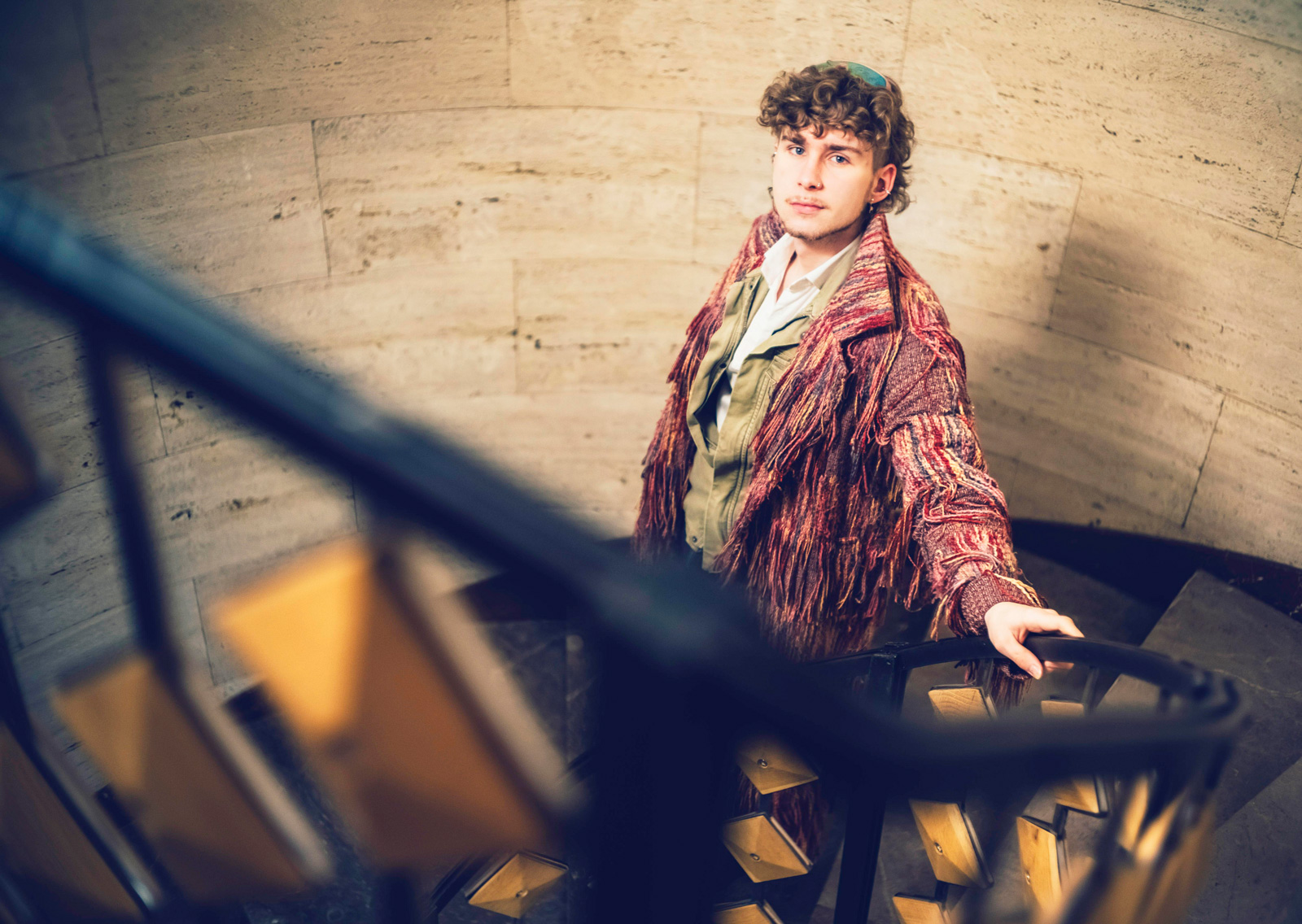 young man on the stairs - conversation graphic