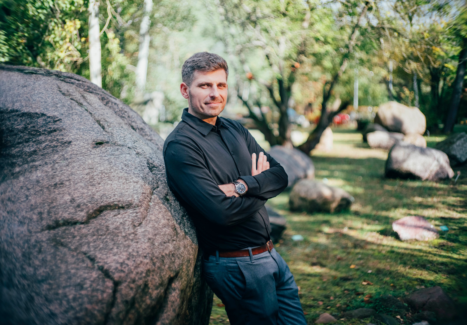 a man leaning against the big rock - conversation graphic