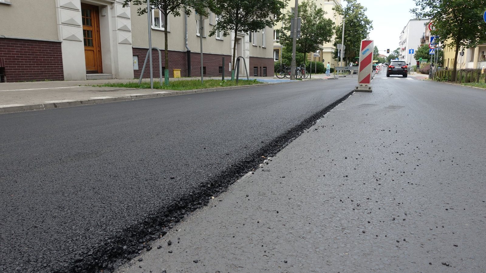 Galeria zdjęć pokazujących postęp prac przy wymianie nawierzchni na ul. Kasprzaka